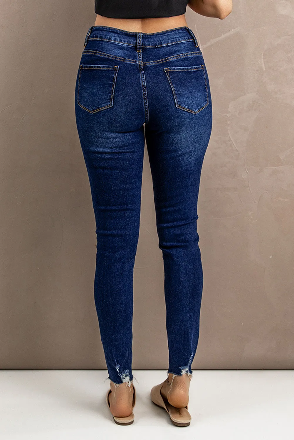 Distressed Button Fly Skinny Jeans