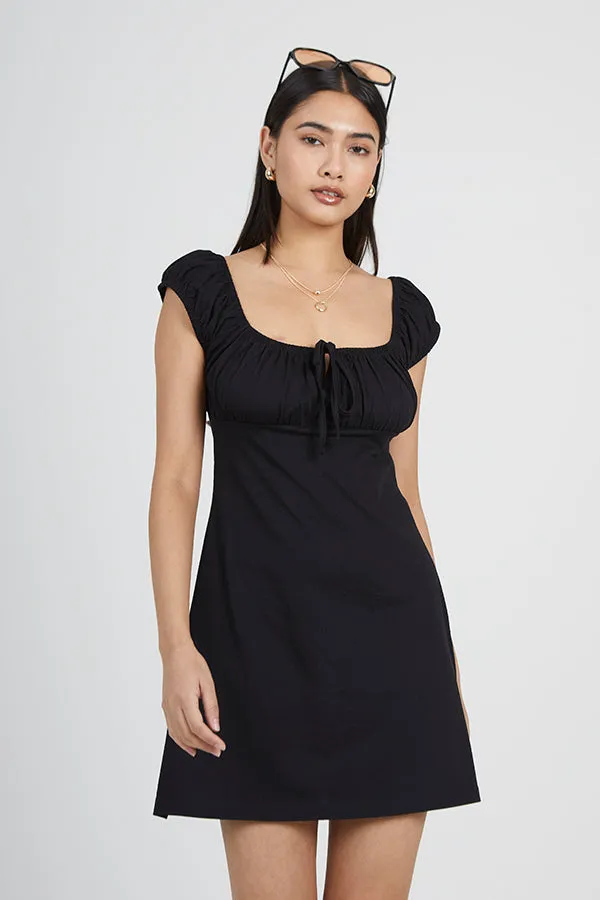 MILKMAID STYLE TIE FRONT MINI DRESS